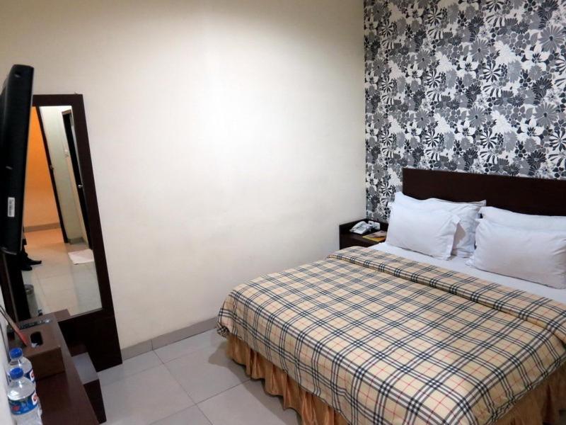 Vindhika Hotel Макасар Номер фото